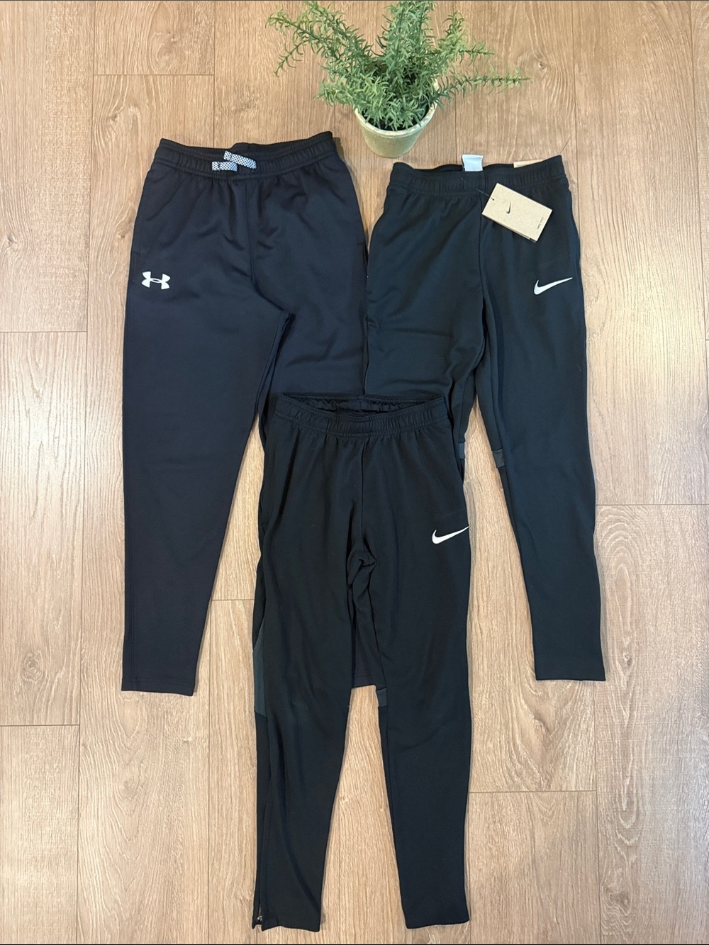 ((3 PAIR)) NIKE AND UNDER ARMOUR BOYS ACTIVE PANTS- ONE NWT AND TWO NWOT SZ MD